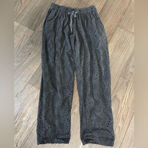 Black eyelet pants. Size small. Brand new tags still on.